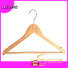 Wholesale coloured wooden coat hangers home for business for children