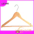 Wholesale coloured wooden coat hangers home for business for children