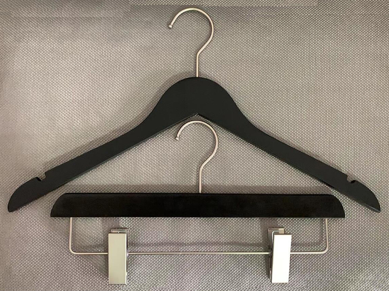 Black wooden hanger with silver metal parts , shirt hanger and pants hanger
