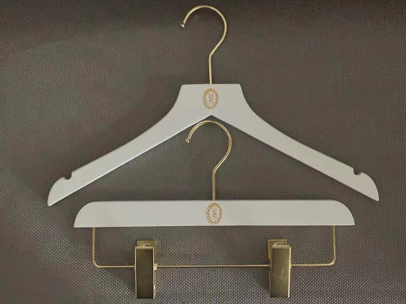 White wooden hanger with custom logo
