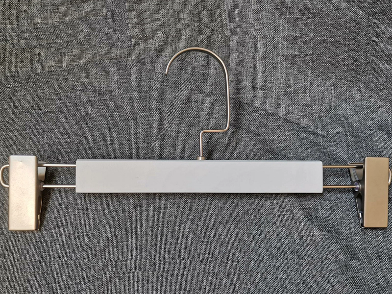 Wooden Pants Hanger With Two Clips On The End Of Hanger