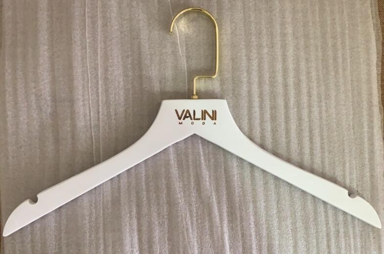 Shirt hangers with engraved logo