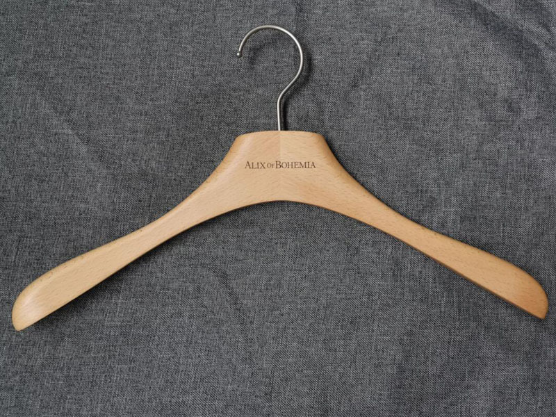 Beech wooden hanger in natural color with customized laser logo