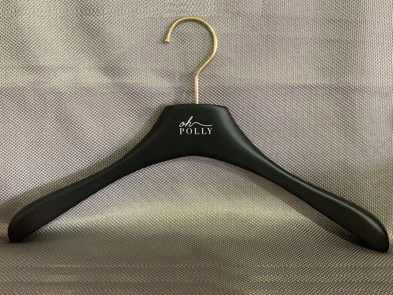 Luxury coat hanger in black and gold metal ,widely shoulder hanger