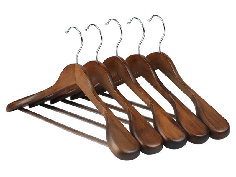 Brown wooden hanger for suits